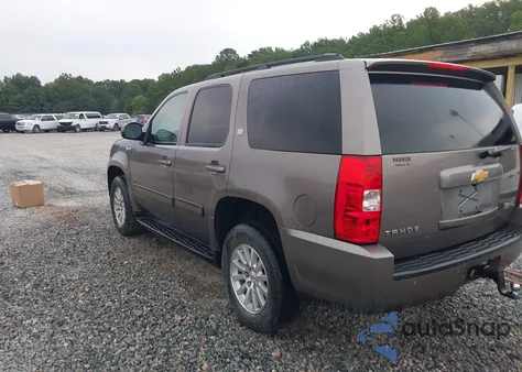 2011 Chevrolet Tahoe Hybrid from USA, damaged, VIN 1GNSKDFJ4BR136650
